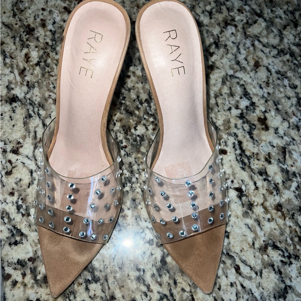 Rae slides. 4 inches heels . Leather outsole.